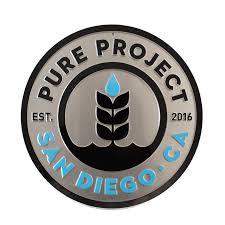 Round logo that says "Pure Project EST. 2016 San Diego, CA