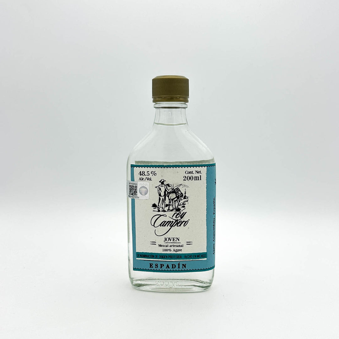 Clear bottle with a label on a white background
