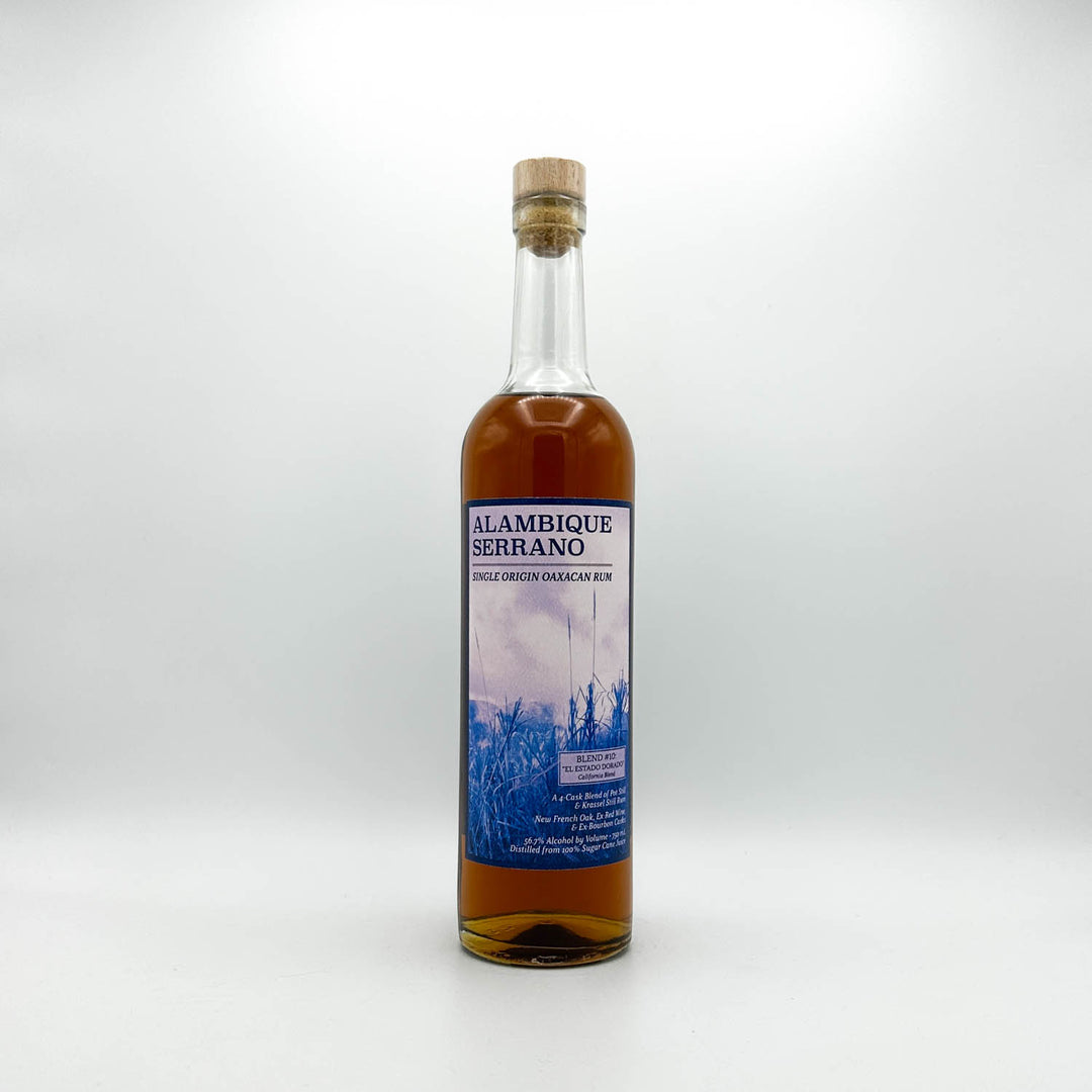 Bottle of Alambique Serrano rum on a white background