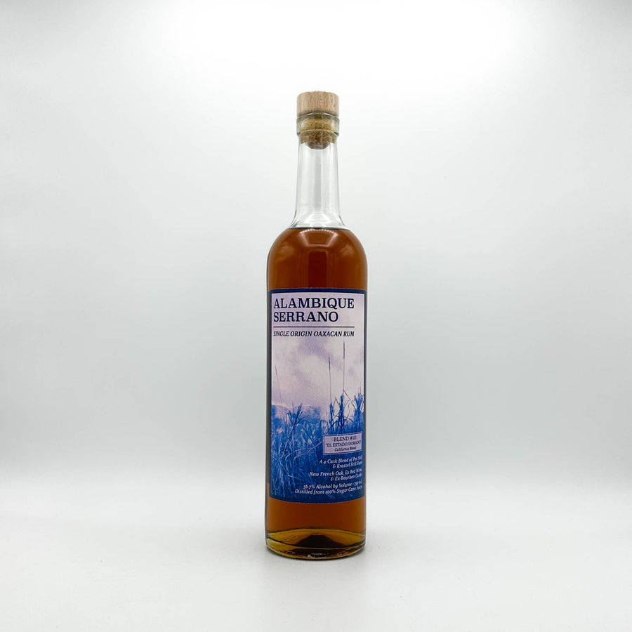Bottle of Alambique Serrano rum on a white background