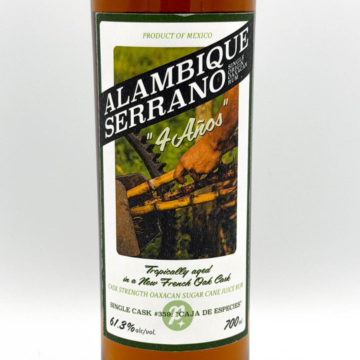 Alambique Serrano bottle with label on a white background