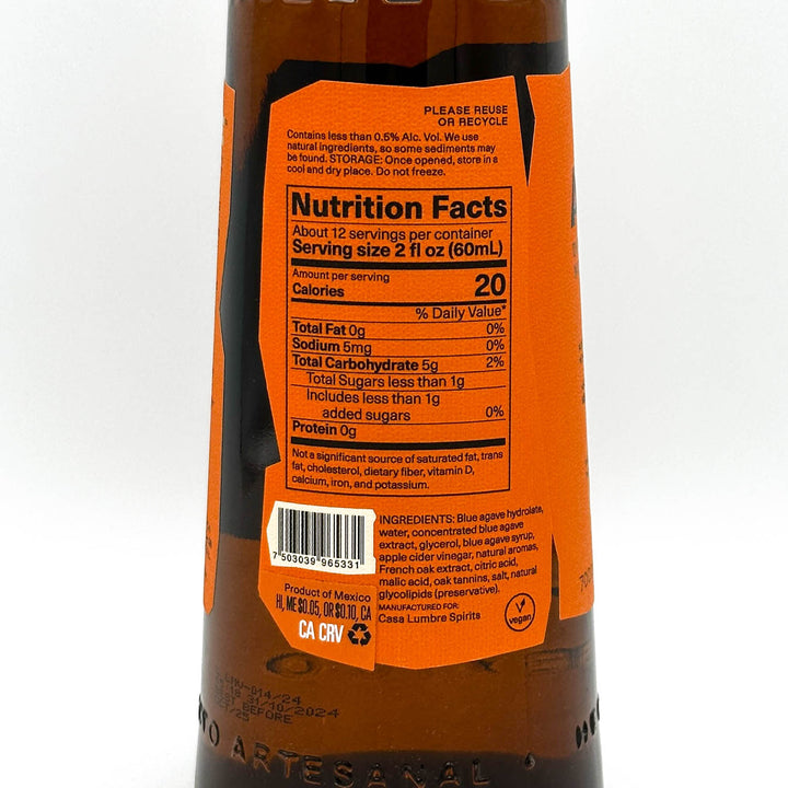 Nutrition facts label on a bottle with an orange label