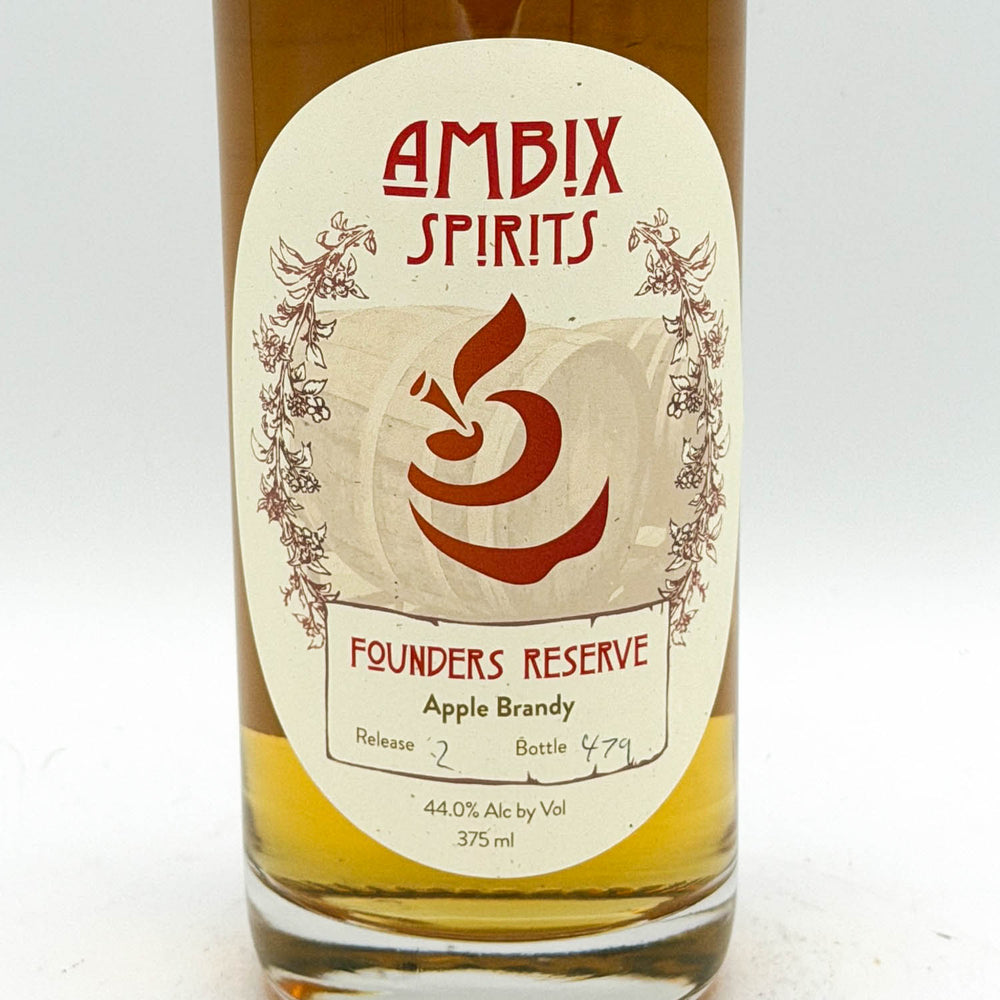 Bottle of Ambix Spirits Founders Reserve Apple Brandy with a white label on a white background