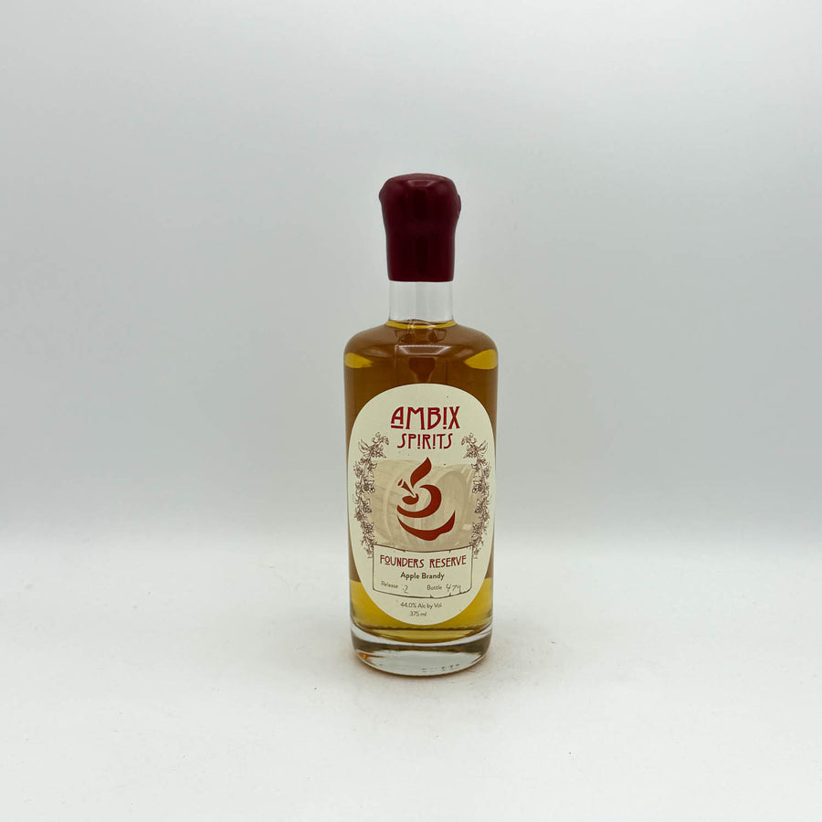 Small bottle of Ambix Spirits on a white background