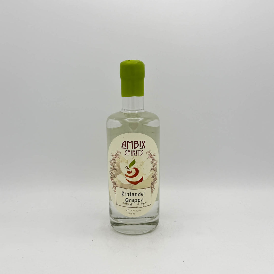 Bottle of Ambix Spirits Zinfandel Grappa on a white background