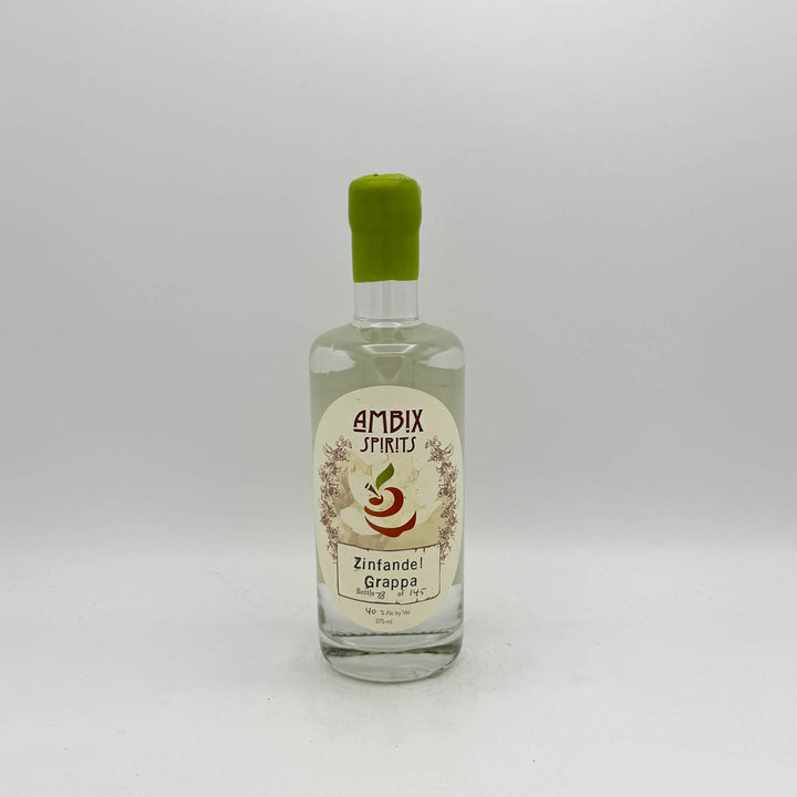 Bottle of Ambix Spirits Zinfandel Grappa on a white background