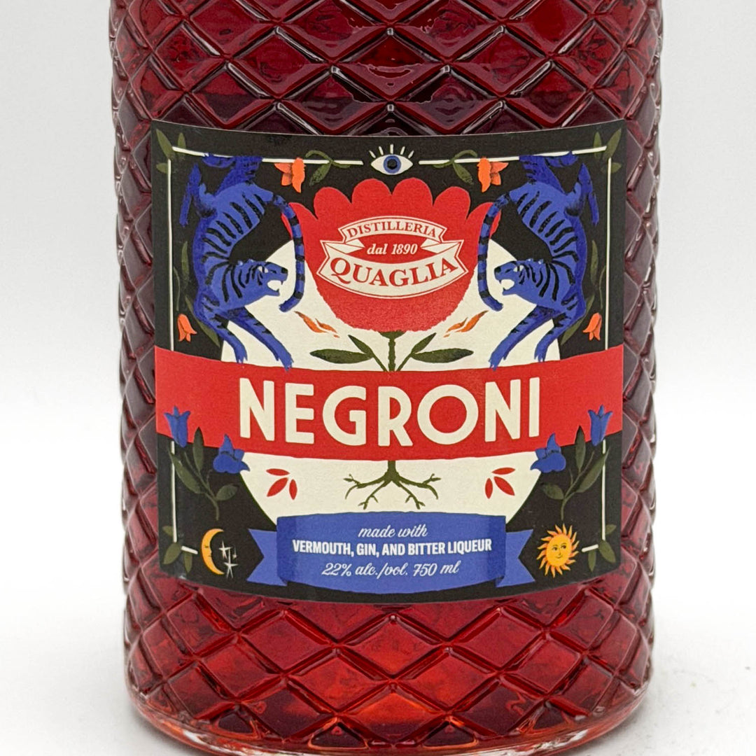 Bottle of Negroni with Quaglia label on a white background
