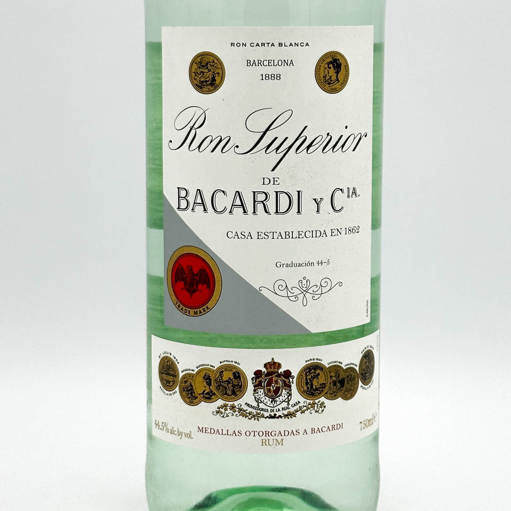 Bacardi Superior rum bottle with label on a white background