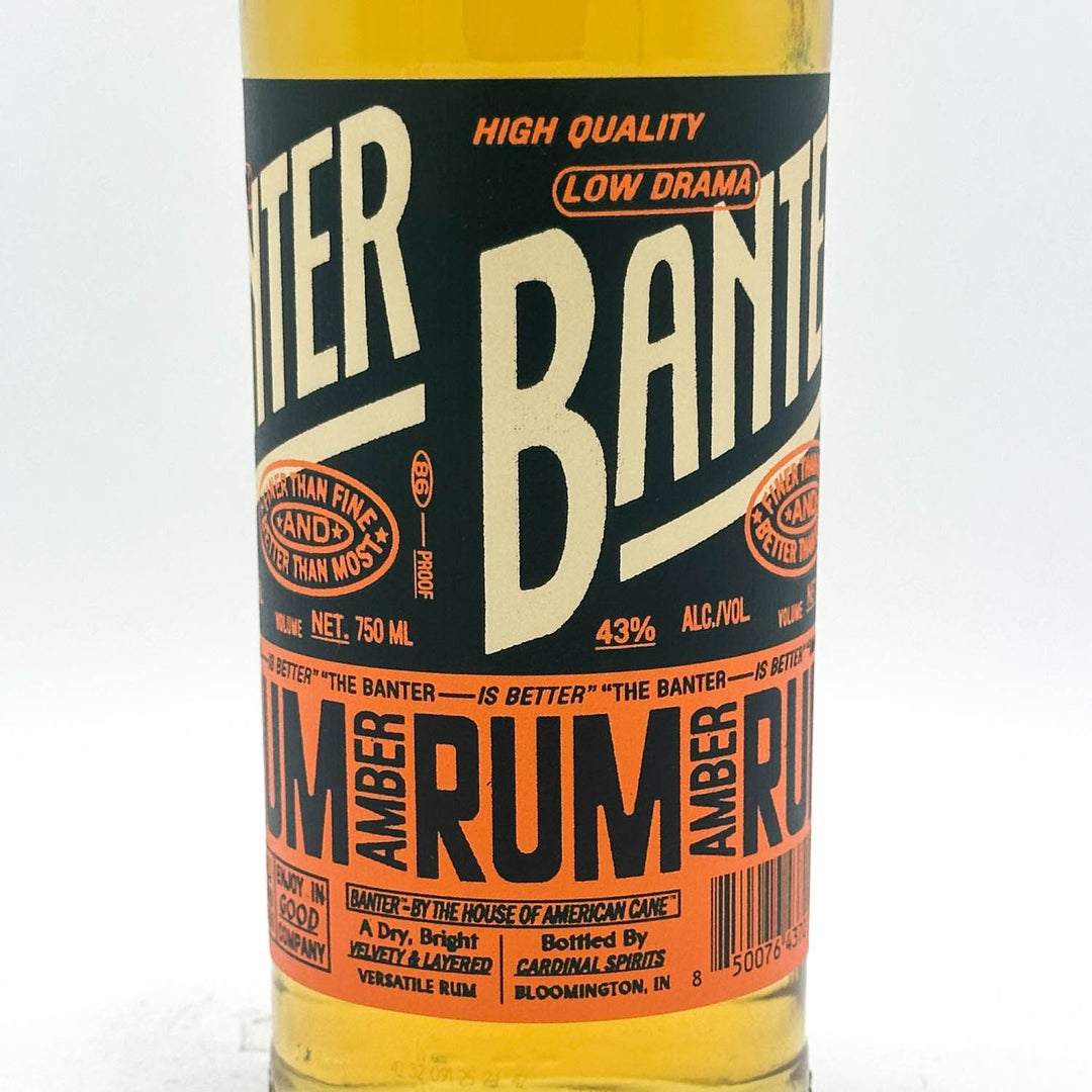 Bottle of Banteer Amber Rum with a colorful label on a white background