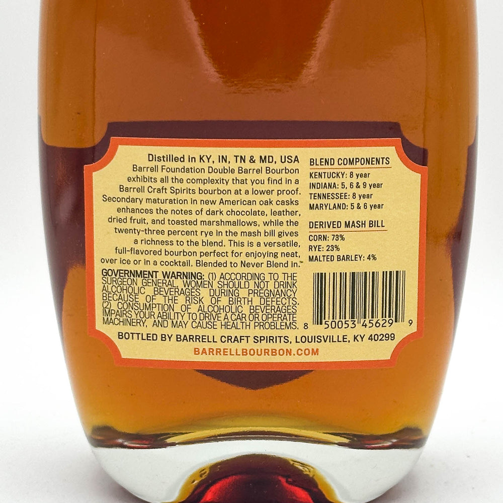 Back label of a Barrell Craft Spirits bourbon bottle on a white background