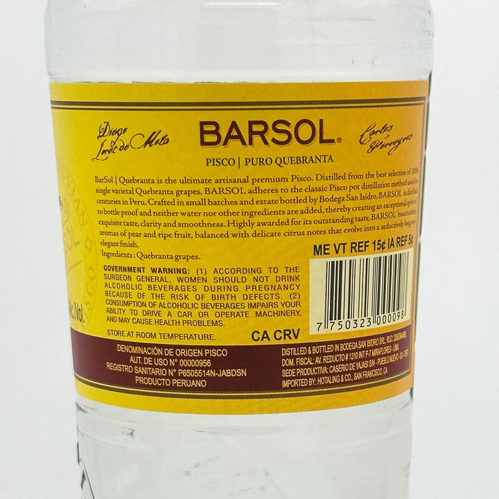 Bottle of Barsol Pisco with a yellow label on a white background