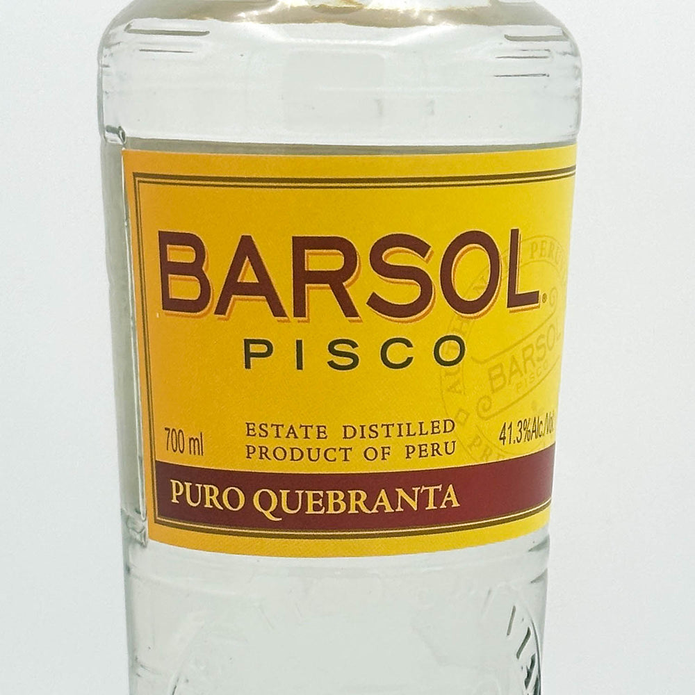 Barsol Pisco bottle with yellow label on a white background