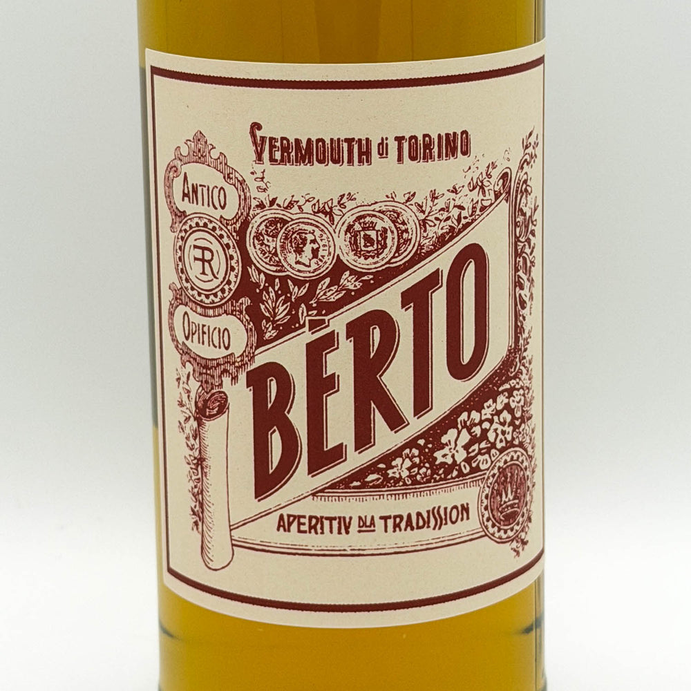 Berto vermouth bottle with decorative label on a white background