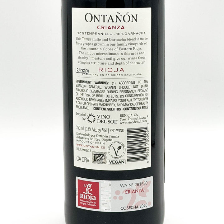 A bottle of Ontañon Crianza Rioja red wine, featuring a dark glass bottle with a white label and a dark red foil capsule at the neck, set against a plain light gray background.