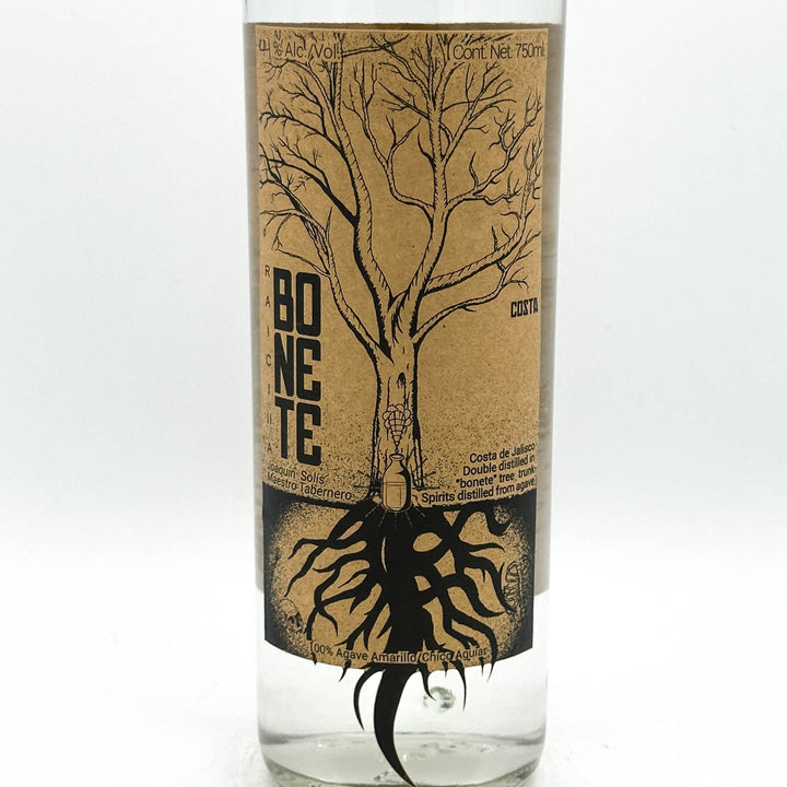 Bottle with a tree design and 'Bone Te' branding on a white background