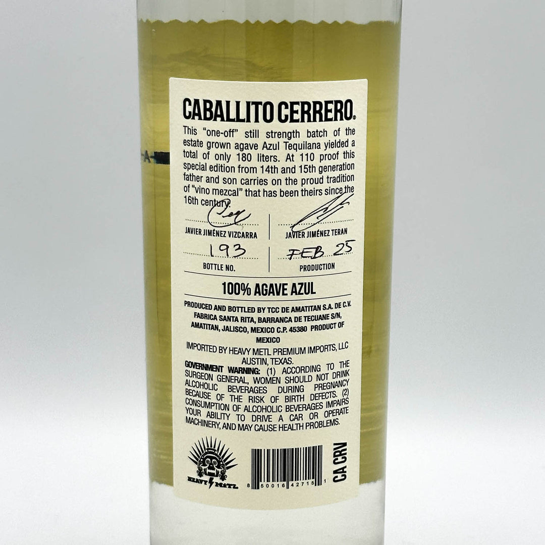 Back label of a Caballito Cerrero tequila bottle on a white background