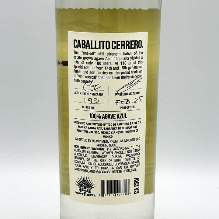 Back label of a Caballito Cerrero tequila bottle on a white background