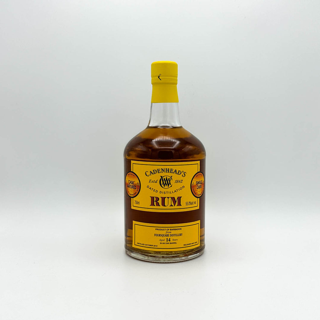 Bottle of Cadenhead's Rum on a white background