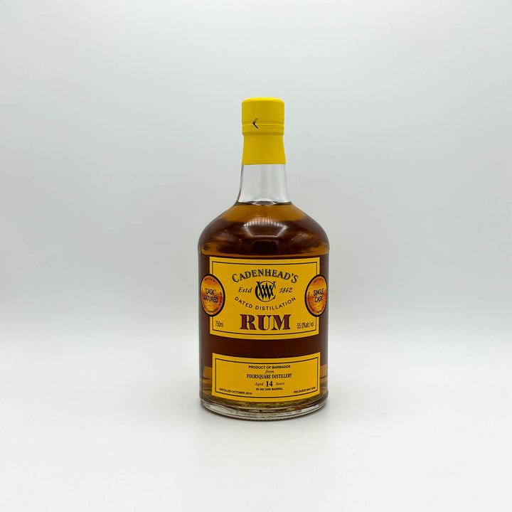 Bottle of Cadenhead's Rum on a white background