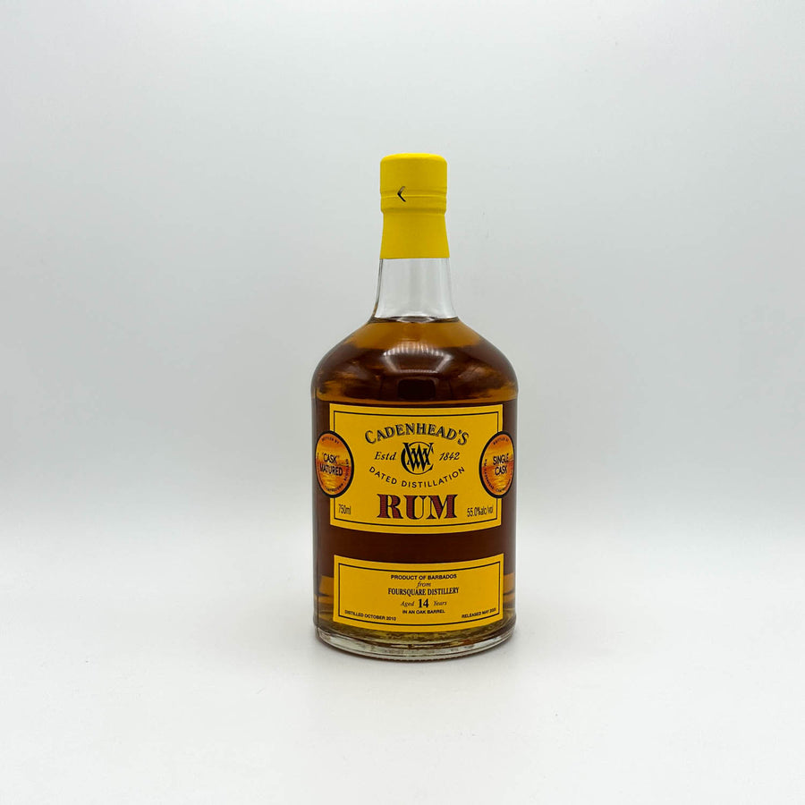 Bottle of Cadenhead's Rum on a white background