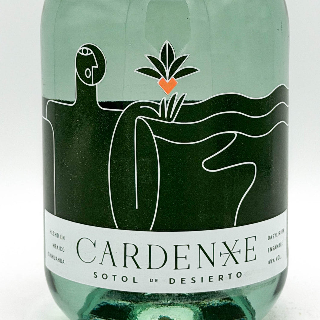 Bottle of Cardenxe Sotol de Desierto with a label featuring abstract designs on a white background