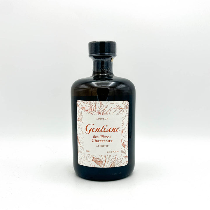 Bottle of Liqueur Gentiane des Pères Chartreux on a white background