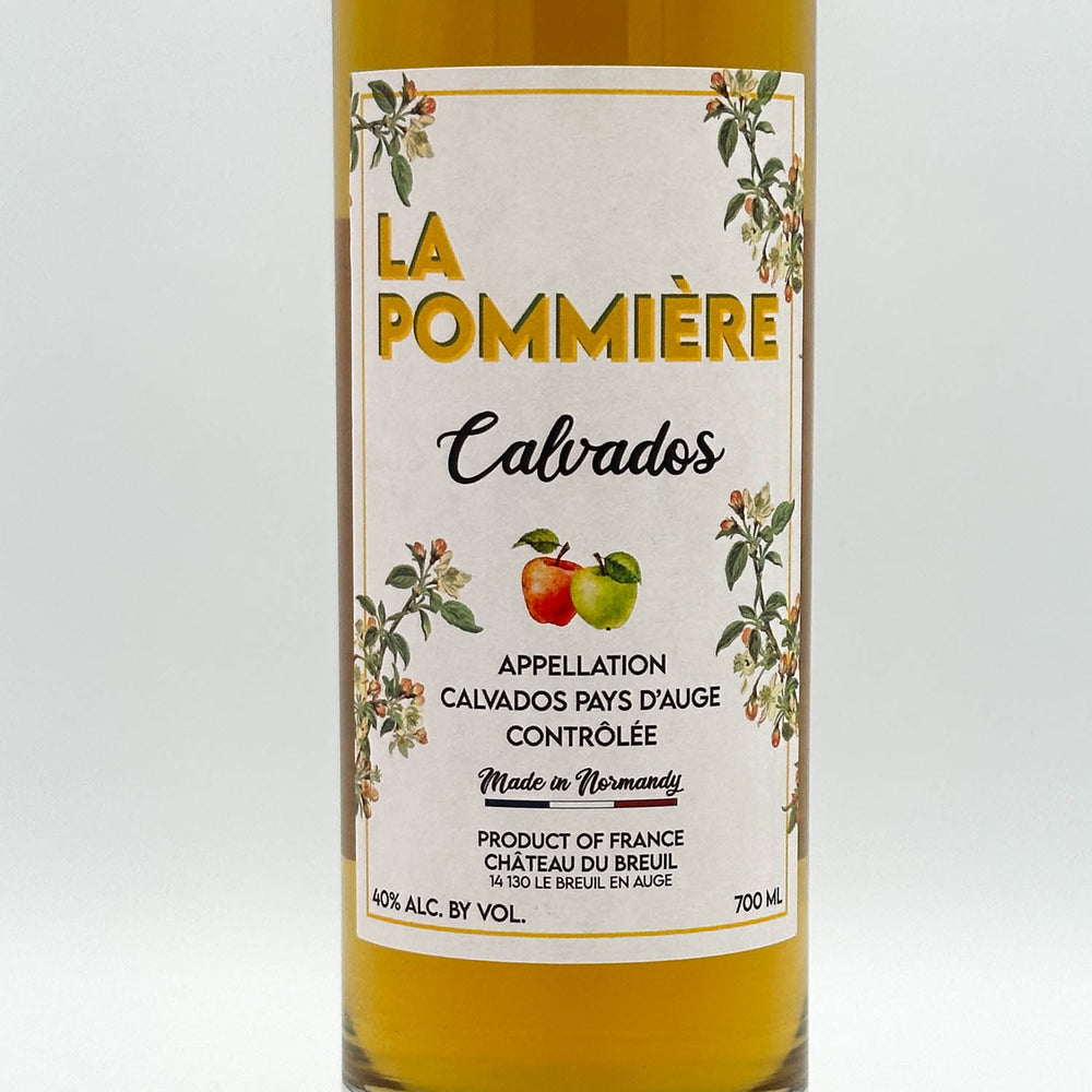 Bottle of La Pommière Calvados with a label on a white background