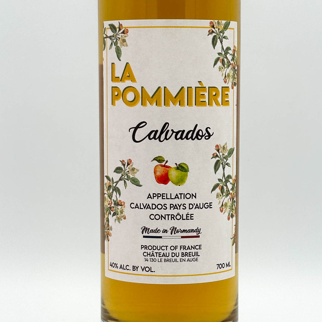 Bottle of La Pommière Calvados with a label on a white background