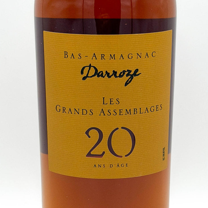 Bottle of Bas-Armagnac Darroze Les Grands Assemblages 20 Ans d'Age with a yellow label on a white background