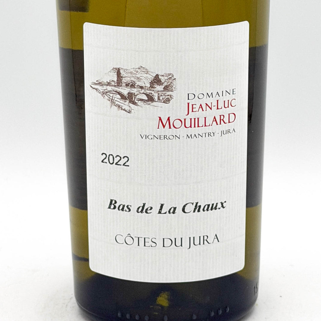 Wine bottle with 'Domaine Jean-Luc Mouillard' label on a white background