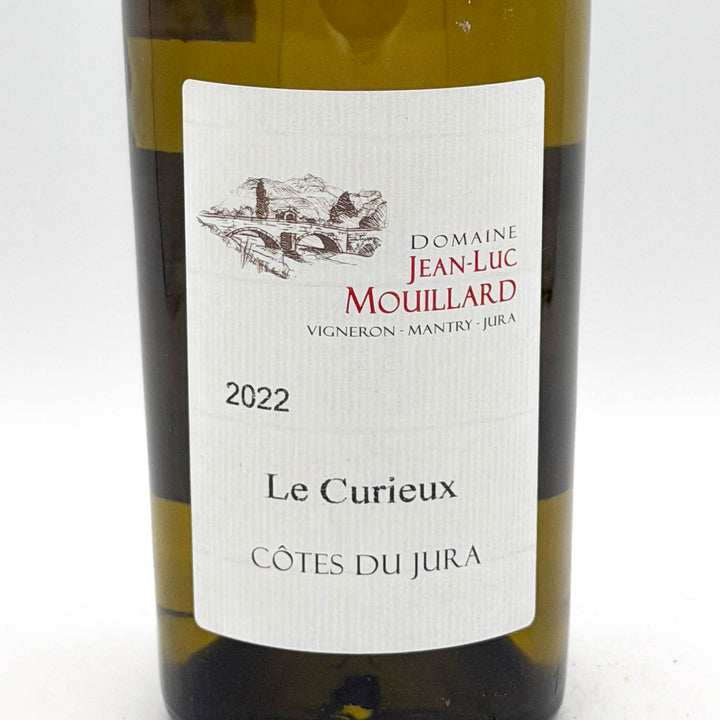 Wine bottle with 'Domaine Jean-Luc Mouillard' label on a white background