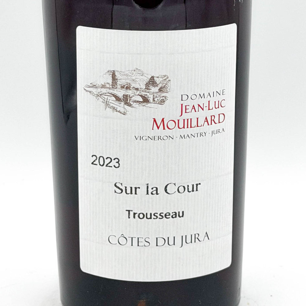 Wine bottle with 'Domaine Jean-Luc Mouillard' label on a white background