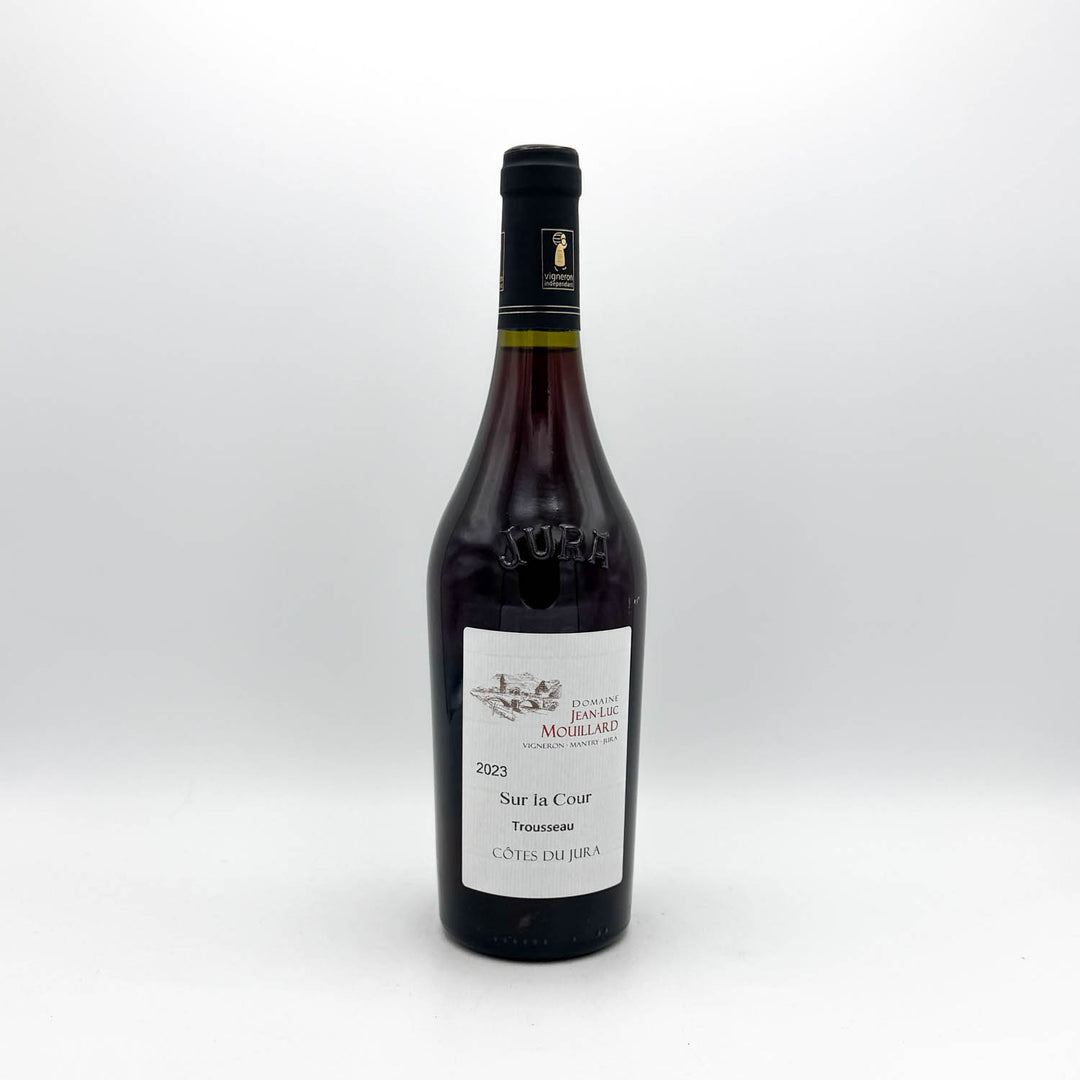 Wine bottle with a label on a white background
