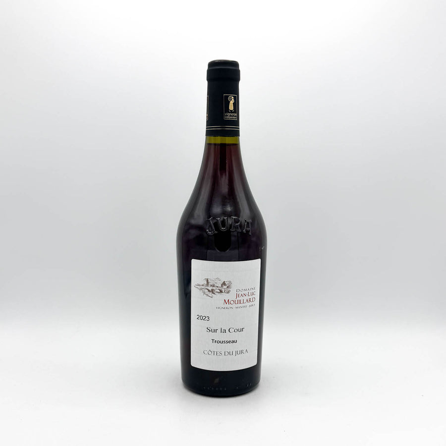 Wine bottle with a label on a white background