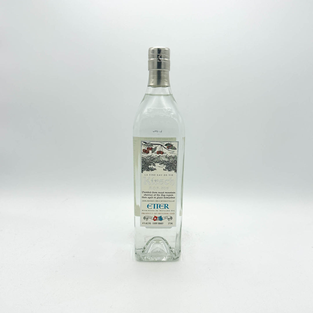 Clear bottle with a silver cap on a white background