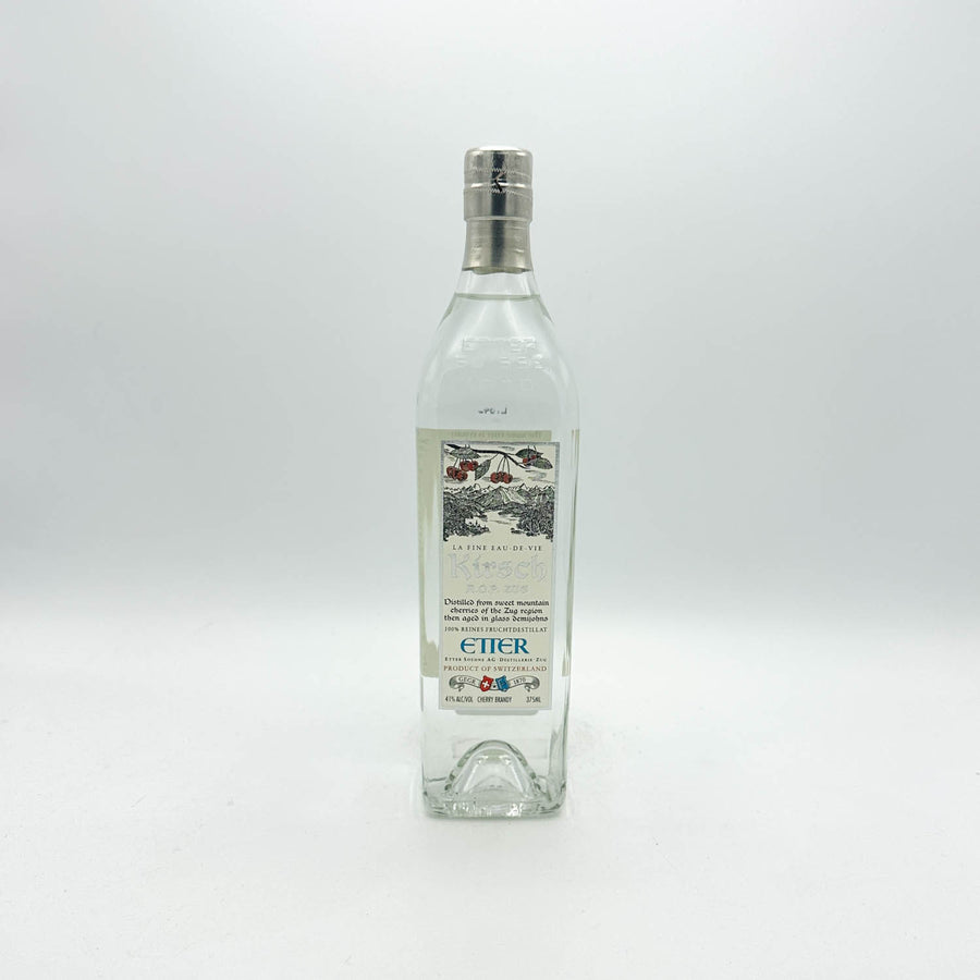 Clear bottle with a silver cap on a white background
