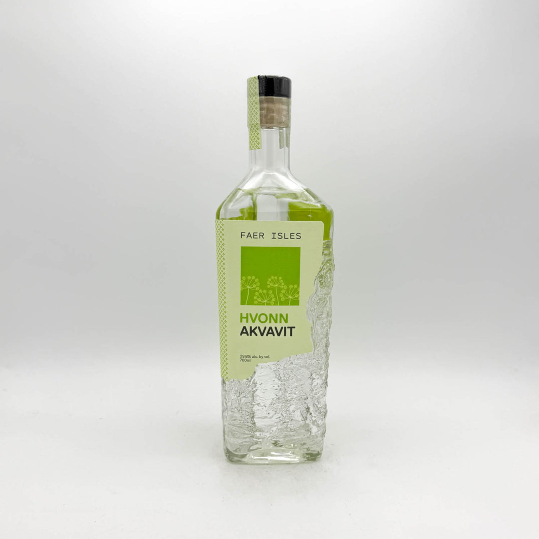 Bottle of Hvonn Akvavit with a green label on a white background