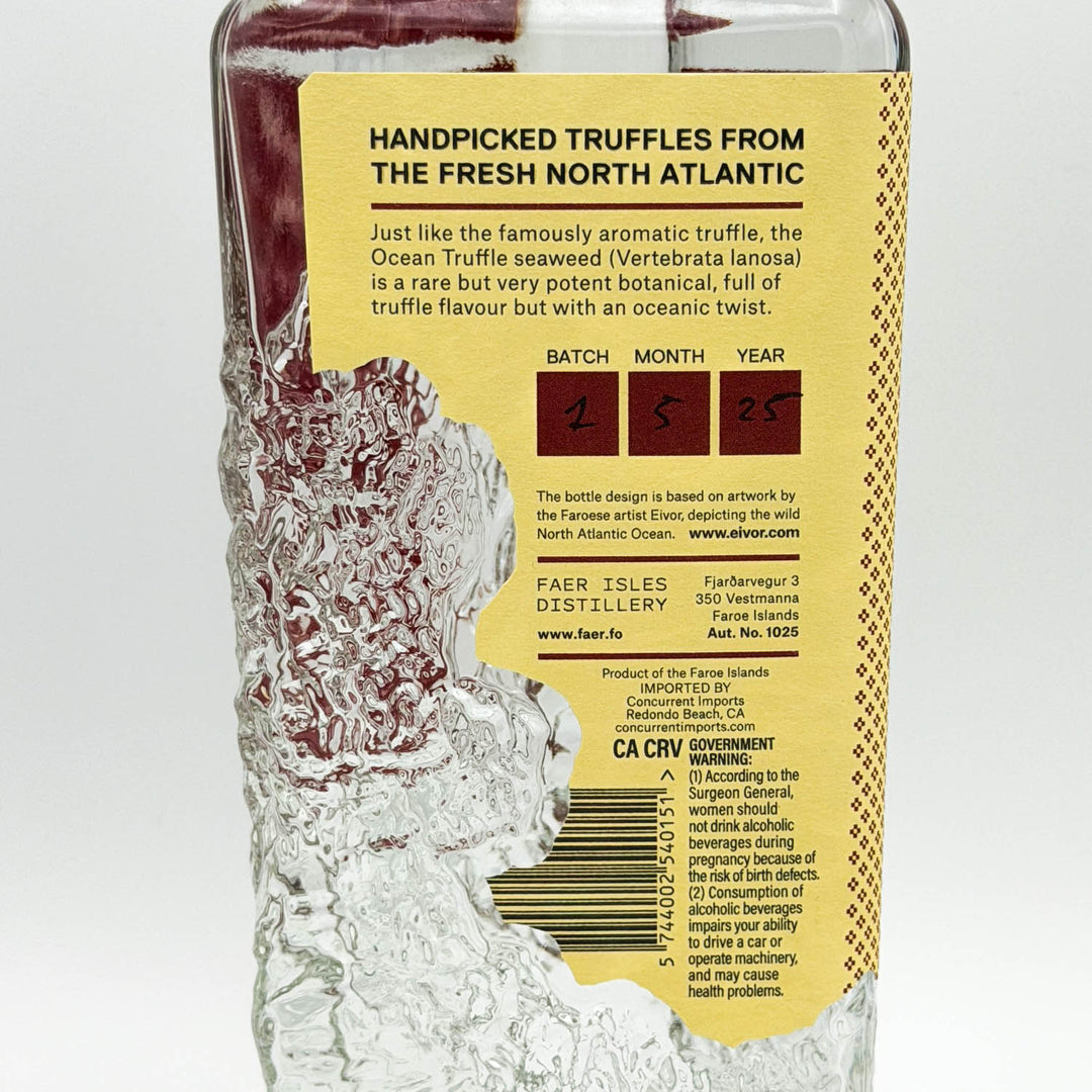 Bottle of Ocean Truffle Seaweed with a yellow label on a white background