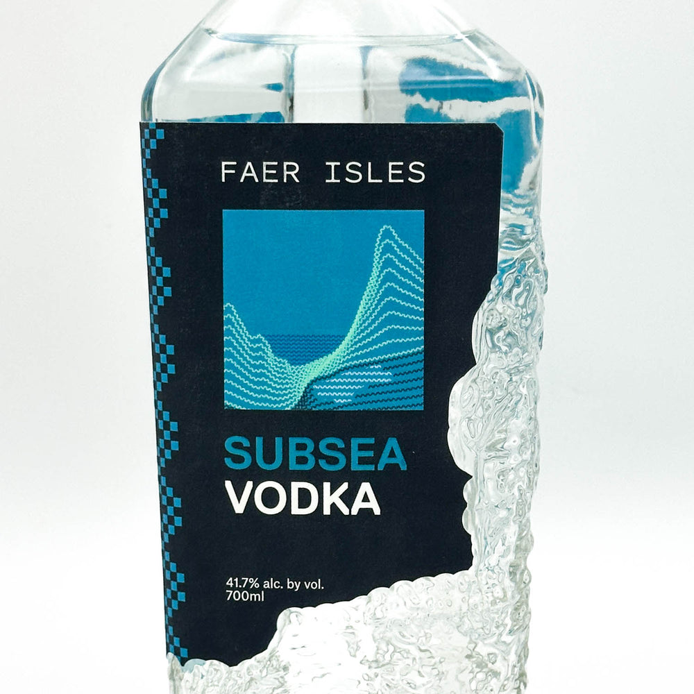 A bottle of Faer Isles Subsea Vodka, 700ml, featuring a black label with a blue graphic design and white text, set against a clean white background.