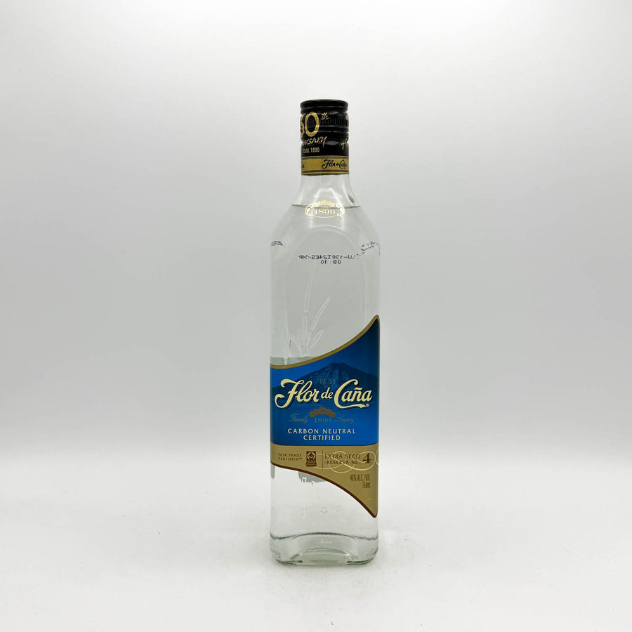 A bottle of Flor de la Cana Carbon Neutral Spirit de Alcohol 70% on a light gray background.