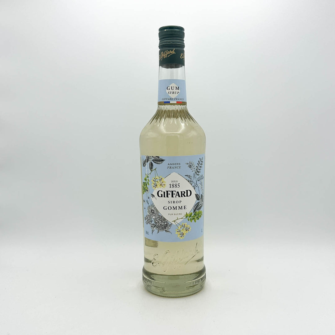 Bottle of Giffard gum syrup on a white background