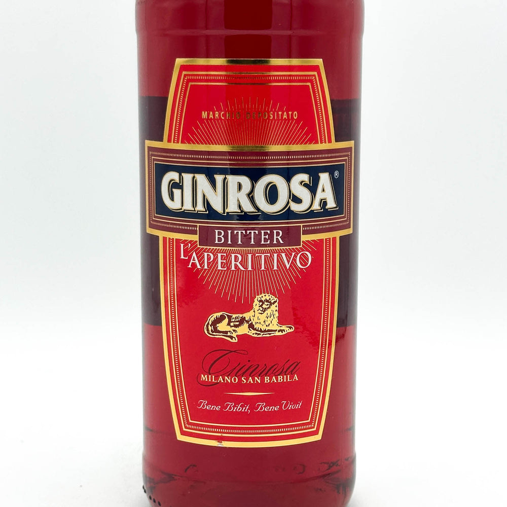 Bottle of Ginrosa Bitter L'aperitivo with a red label on a white background