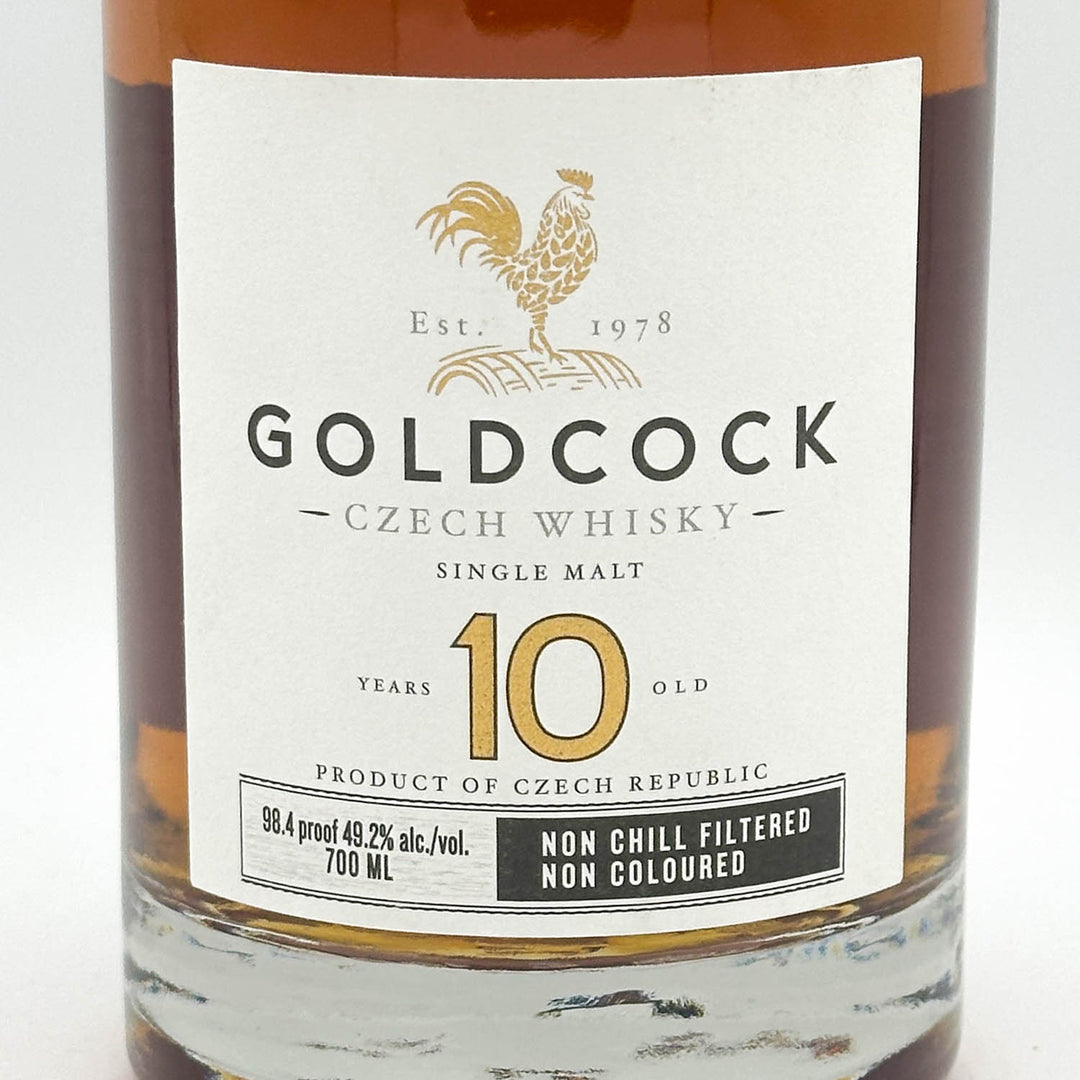 Goldcock Czech Whisky bottle with label on a white background