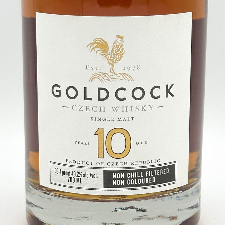 Goldcock Czech Whisky bottle with label on a white background