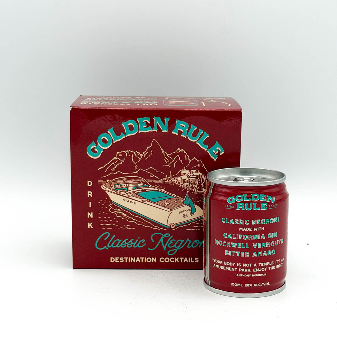 Red can and box of Golden Rule Classic Negroni cocktails on a white background