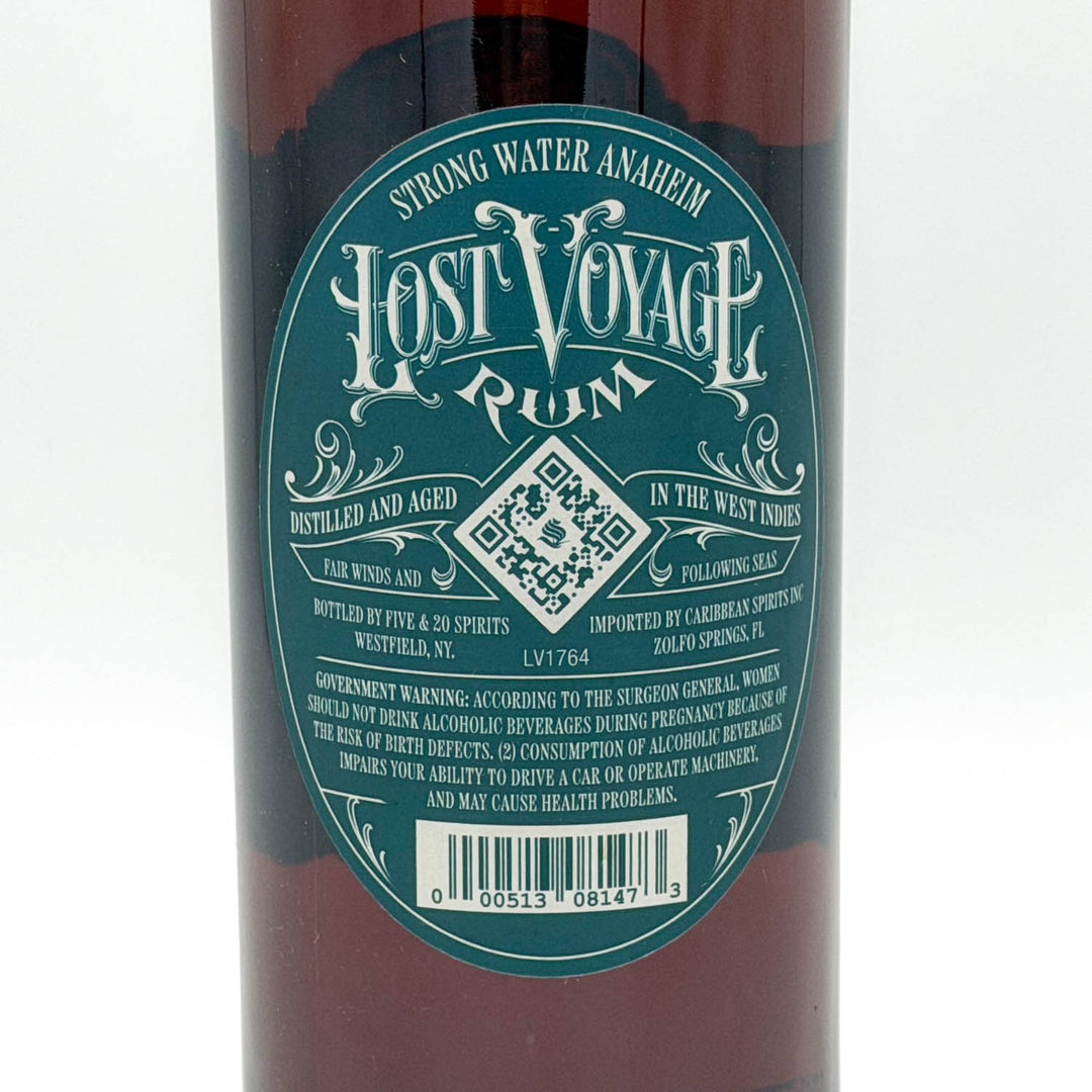 Lost Voyage Rum bottle with green label on a white background