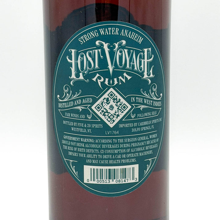 Lost Voyage Rum bottle with green label on a white background