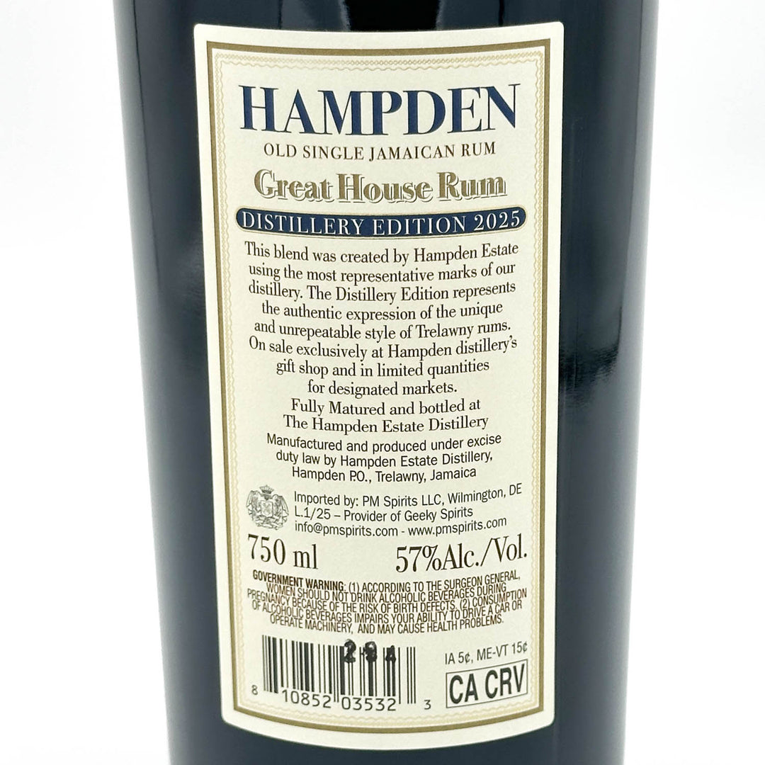 Close-up of the back label of a Hampden Great House Rum bottle, showing product details, barcode, and text on a dark bottle background.