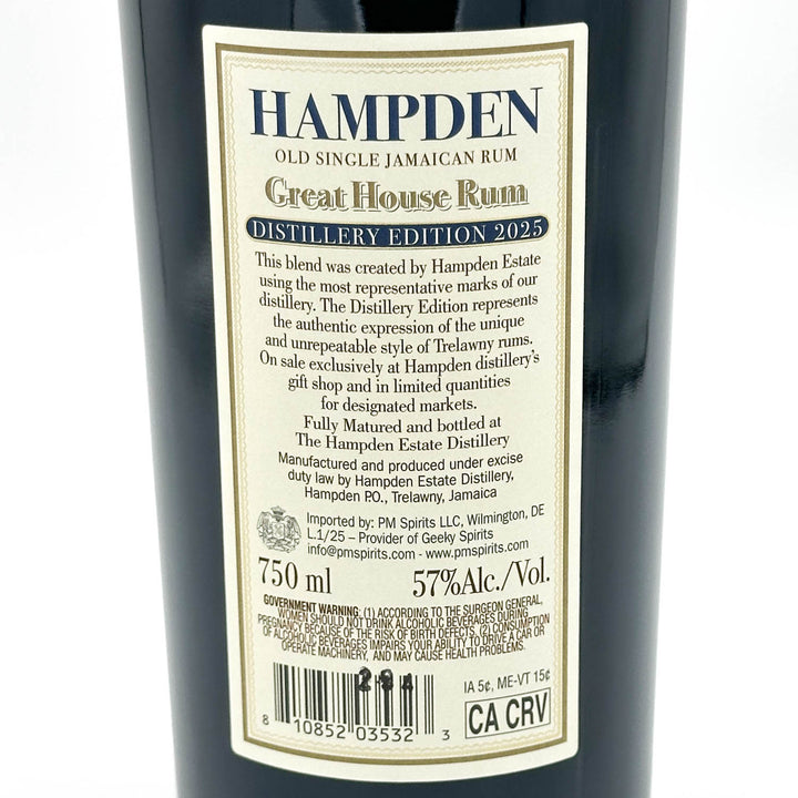 Close-up of the back label of a Hampden Great House Rum bottle, showing product details, barcode, and text on a dark bottle background.