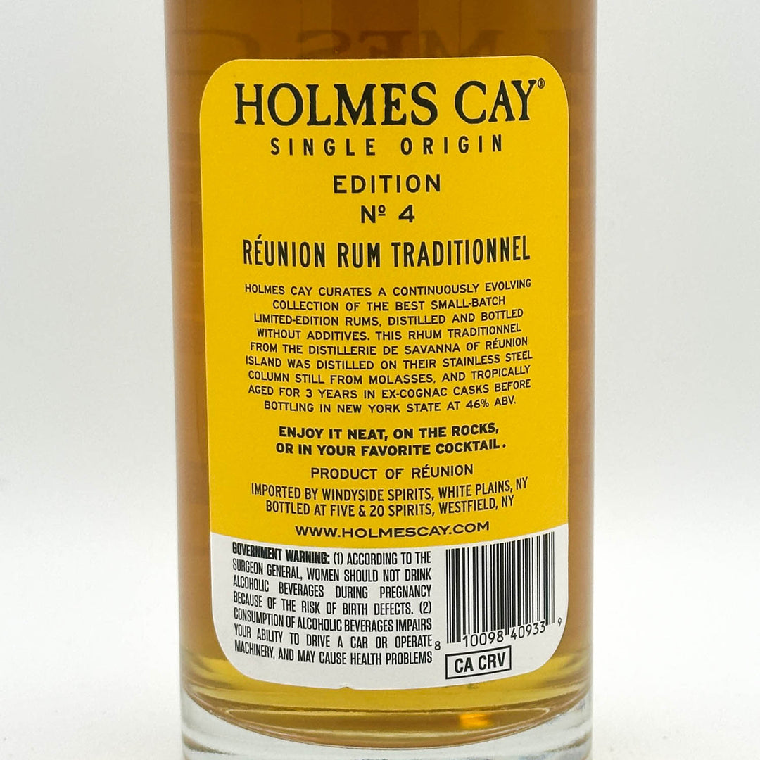Bottle of Holmes Cay Single Origin Edition No. 4 Réunion Rum Traditionnel with a yellow label.